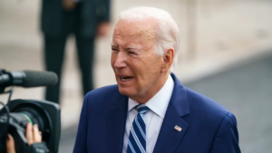 In this photo, President Joe Biden looks old and a bit lost while being interviewed.